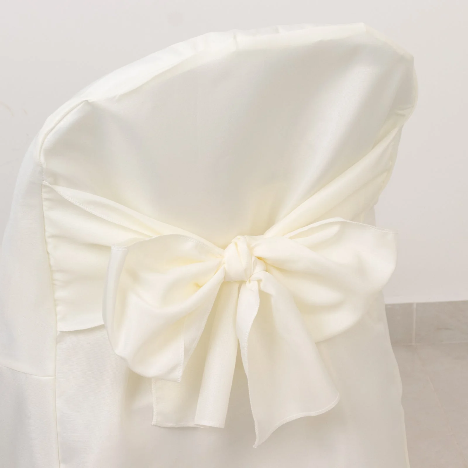 10-Pack Polyester Folding Chair Covers with Attached Sashes – Ivory Durable Reusable Slip-On Covers for Wedding & Event Decor - Image 6